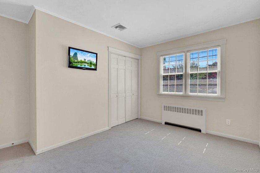 Welcome to this beautifully expanded ranch nestled in one of the - photo 15