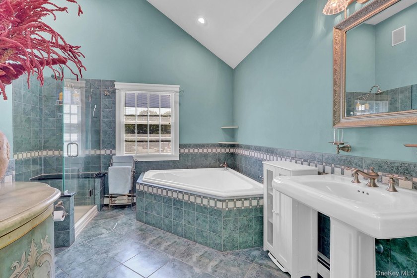 Welcome to this beautifully expanded ranch nestled in one of the - photo 27