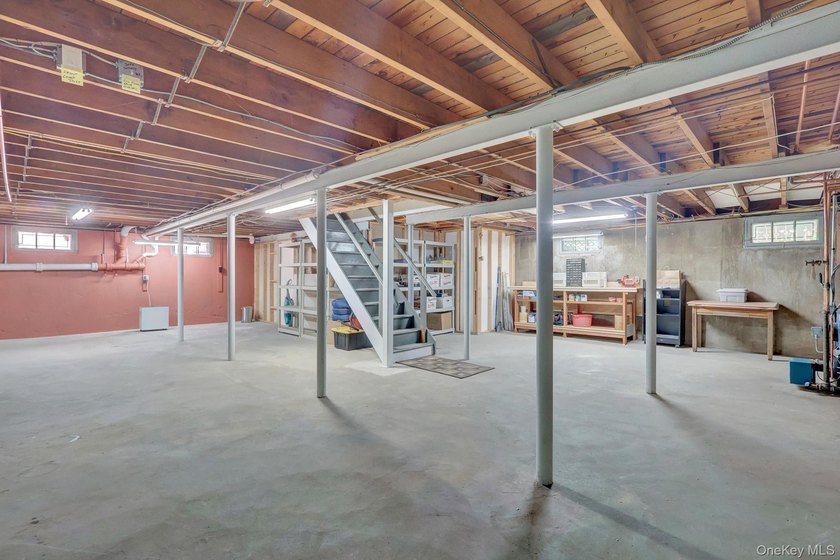 Welcome to this beautifully expanded ranch nestled in one of the - photo 31