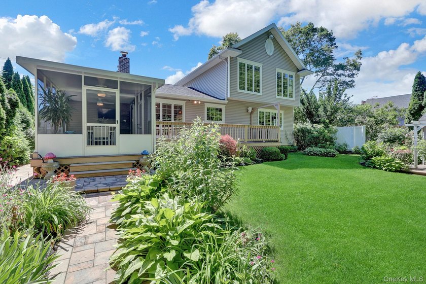 Welcome to this beautifully expanded ranch nestled in one of the - photo 34