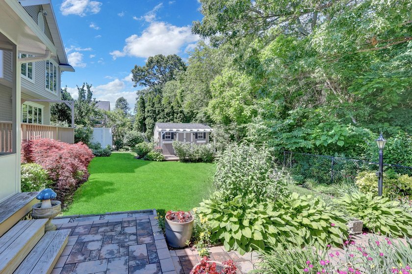 Welcome to this beautifully expanded ranch nestled in one of the - photo 35