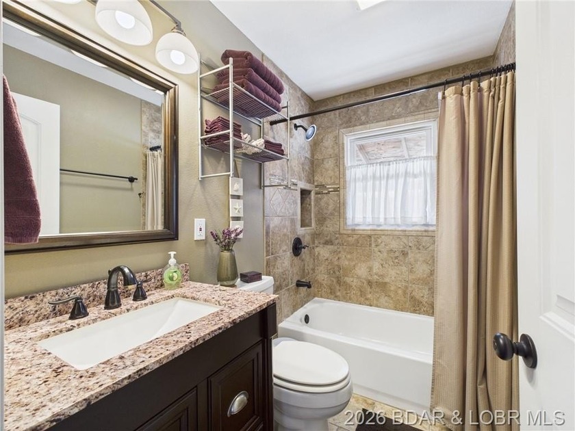 2-bedroom, 1.5 bath home situated on a level 0.13-acre lot with - photo 18