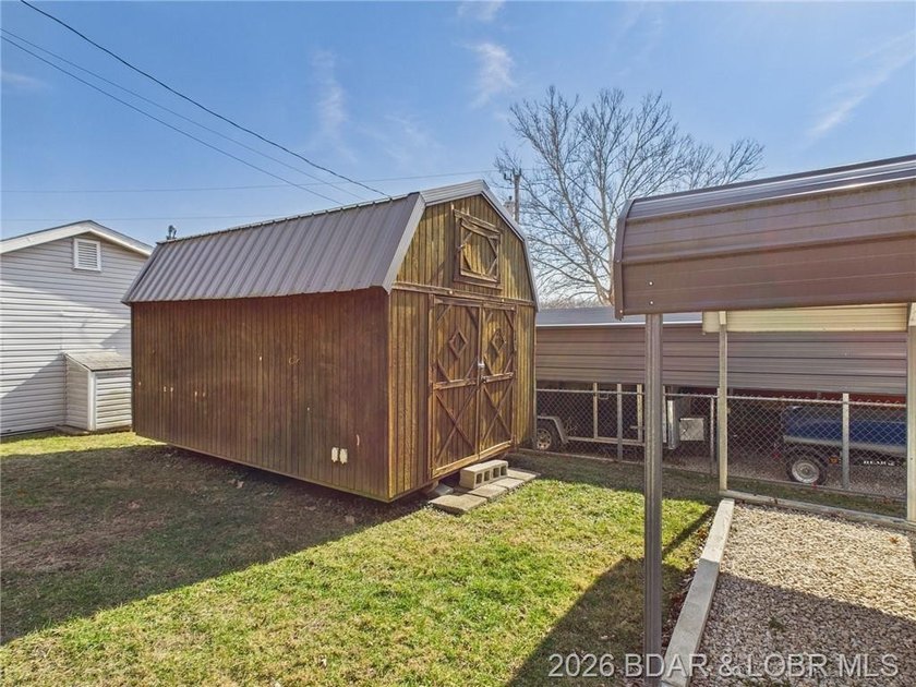 2-bedroom, 1.5 bath home situated on a level 0.13-acre lot with - photo 36