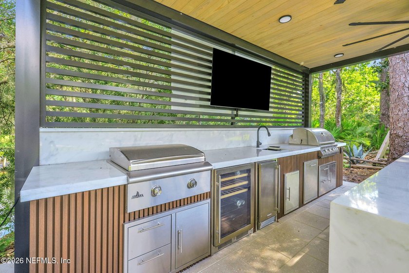 Luxury redefined! This fully modernized single-story gem in - photo 35