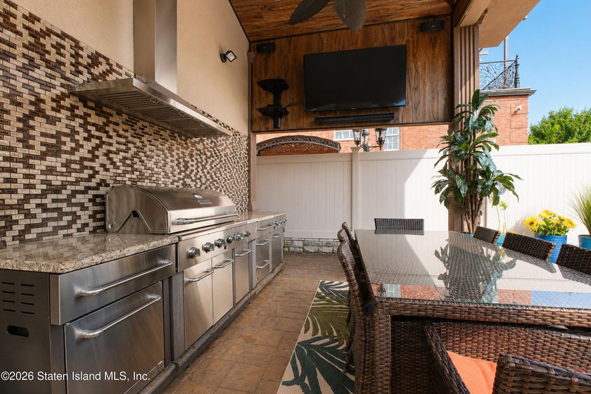 Welcome to this exceptional detached two-family residence where - photo 11