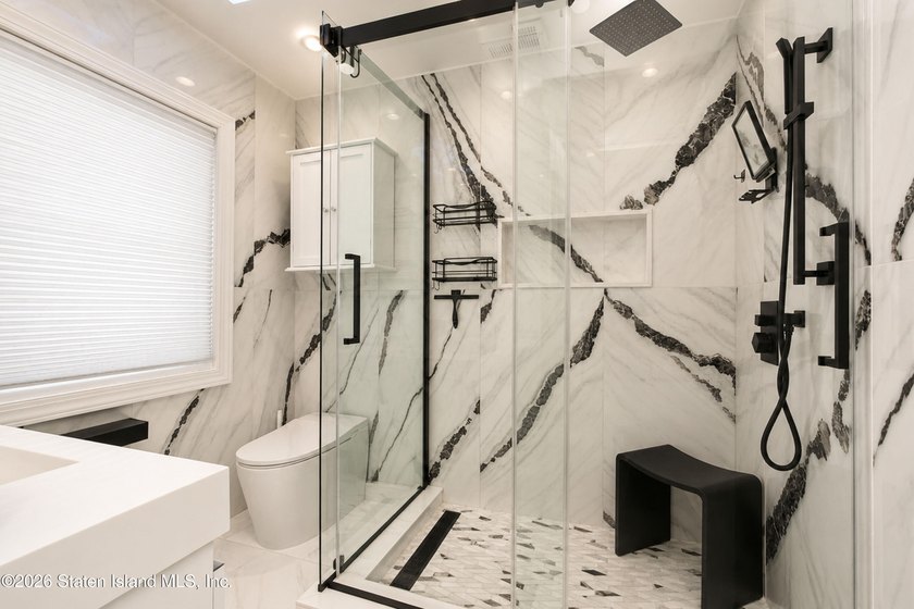 Welcome to this exceptional detached two-family residence where - photo 20
