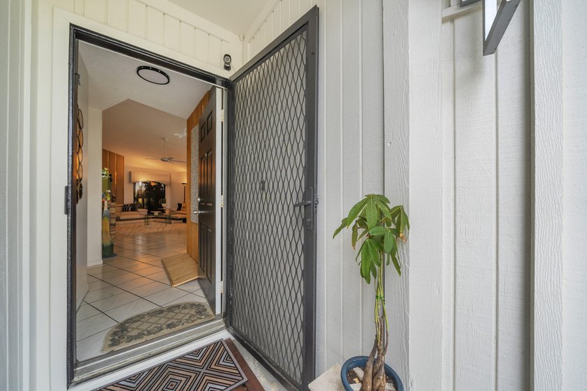 Welcome home to this beautifully maintained and thoughtfully - photo 3