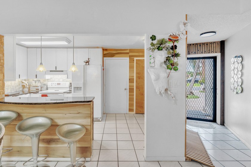 Welcome home to this beautifully maintained and thoughtfully - photo 6