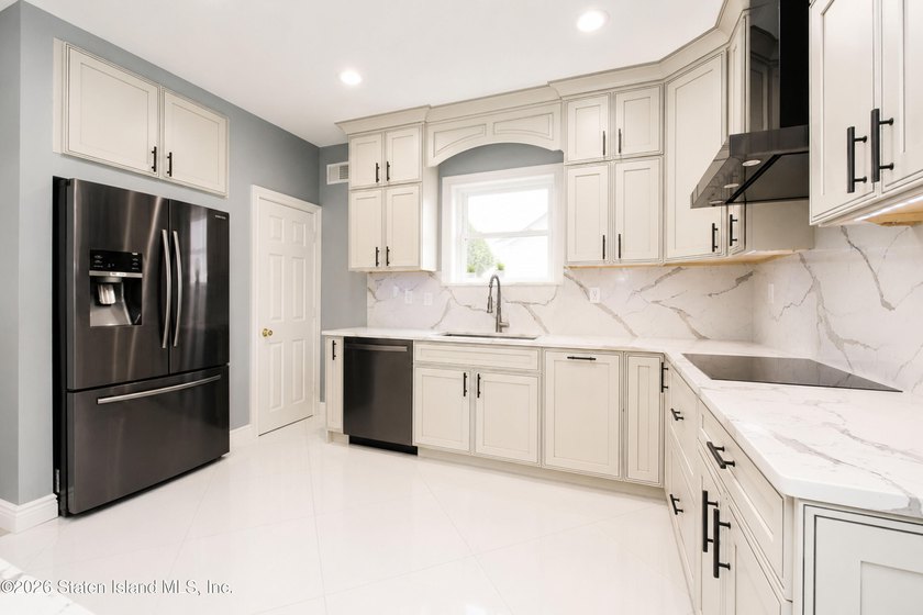 Welcome to this exceptional detached two-family residence where - photo 39