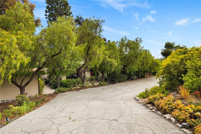 Perched in the highly sought after Portuguese Bend community of - photo 7