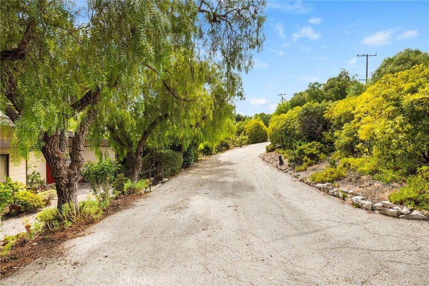 Perched in the highly sought after Portuguese Bend community of - photo 8