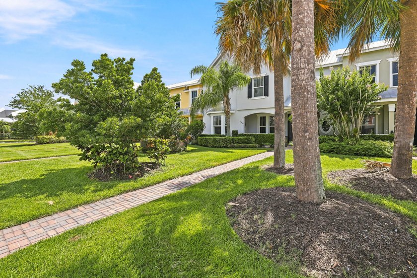 Welcome to this three-bedroom, 2.5-bathroom residence provides - photo 3