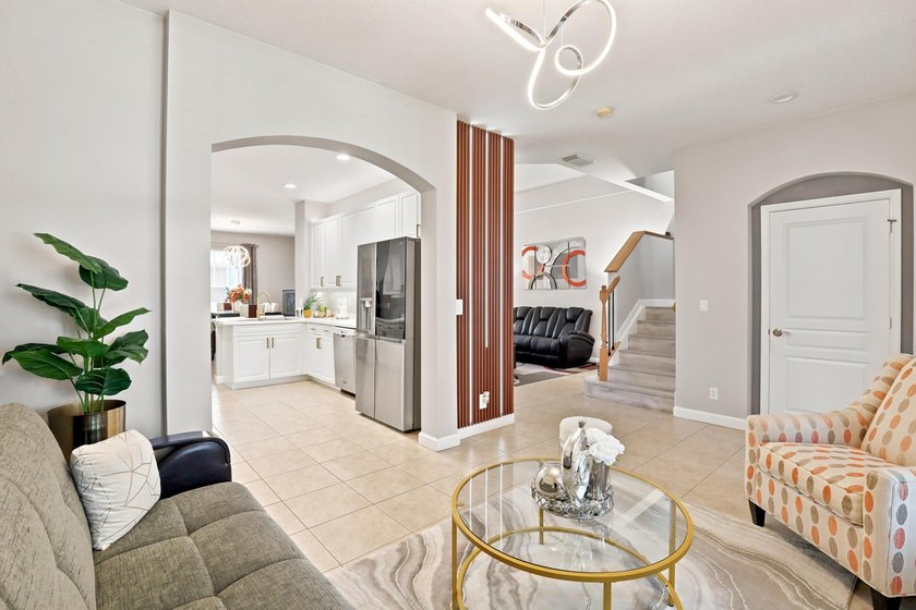 Welcome to this three-bedroom, 2.5-bathroom residence provides - photo 8