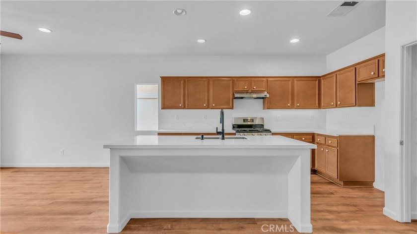 Welcome to this beautifully upgraded 3-bedroom, 2-bath residence - photo 4
