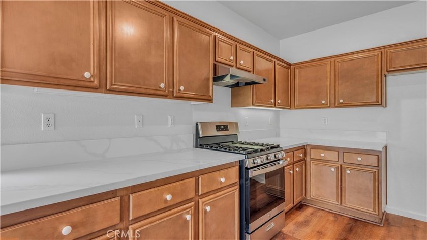 Welcome to this beautifully upgraded 3-bedroom, 2-bath residence - photo 8