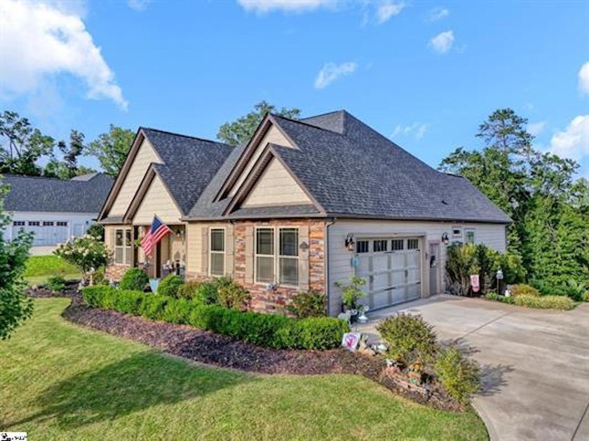 Enjoy lake living at its finest in this beautifully maintained - photo 3