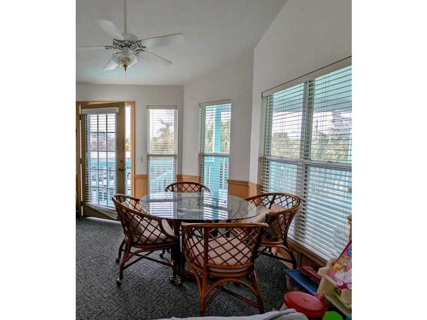 Relaxed coastal charm awaits in this 2-bedroom, 2-bath home on - photo 8