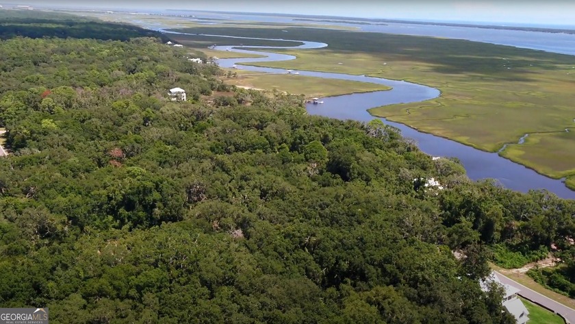 Beautiful marsh front lot with a spectacular sunrise over - photo 12