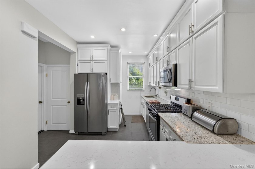 Turn-Key Perfection in the Heart of Pelham Bay! Welcome home to - photo 15
