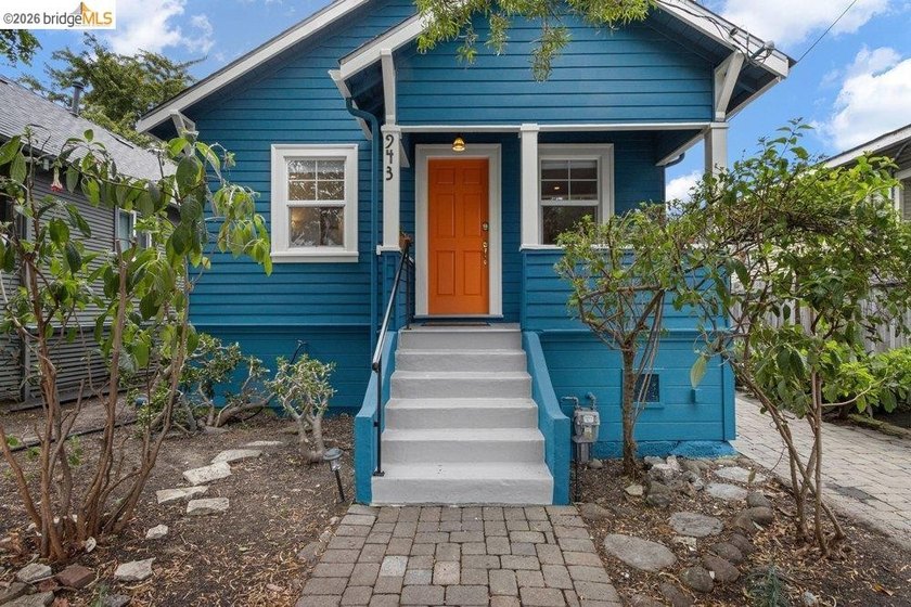 This exceptional 1927 early century cottage presents an - photo 3