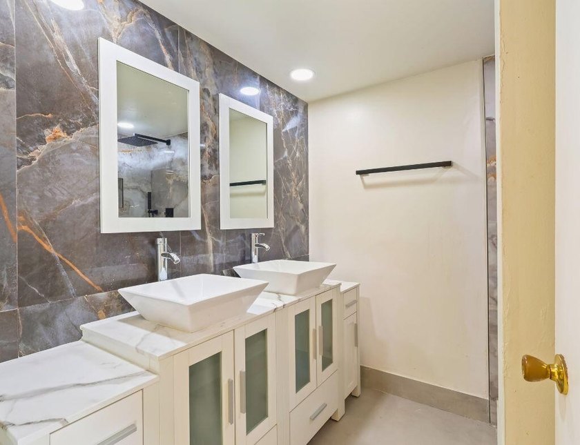 Welcome to this updated 2BR/2.5BA townhouse in the Village of - photo 11