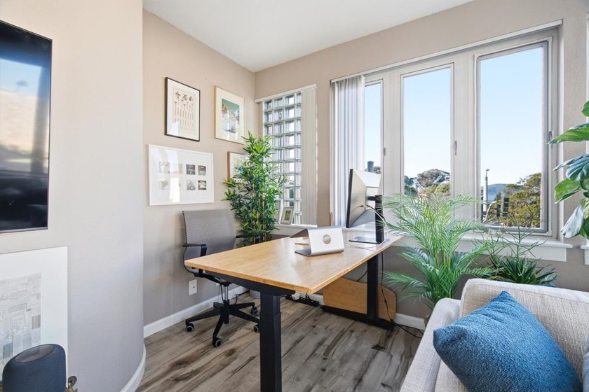 Welcome to this stunning 2-bedroom, 2-bath corner residence in a - photo 13