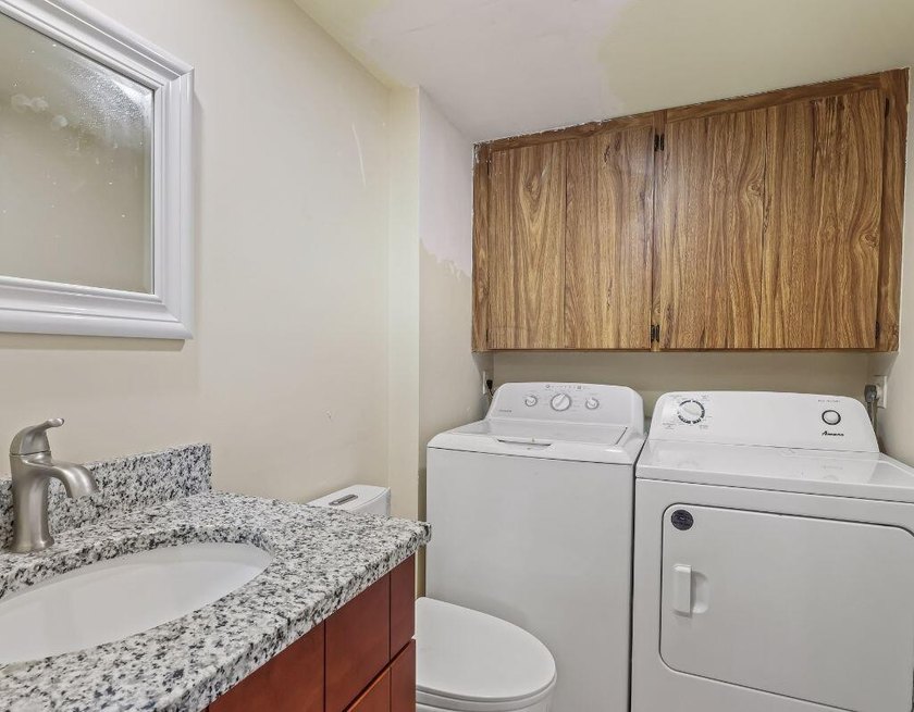Welcome to this updated 2BR/2.5BA townhouse in the Village of - photo 13