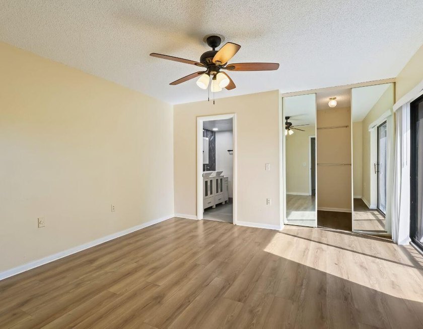 Welcome to this updated 2BR/2.5BA townhouse in the Village of - photo 14