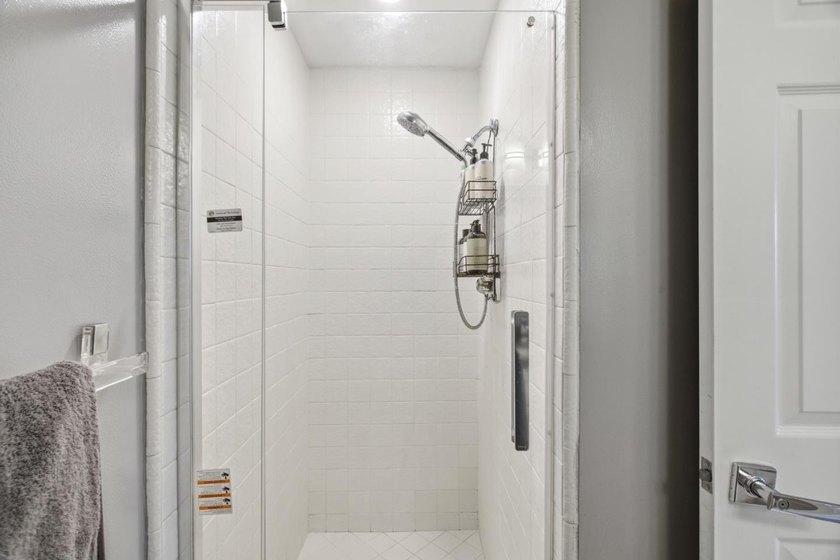 Welcome to this stunning 2-bedroom, 2-bath corner residence in a - photo 27