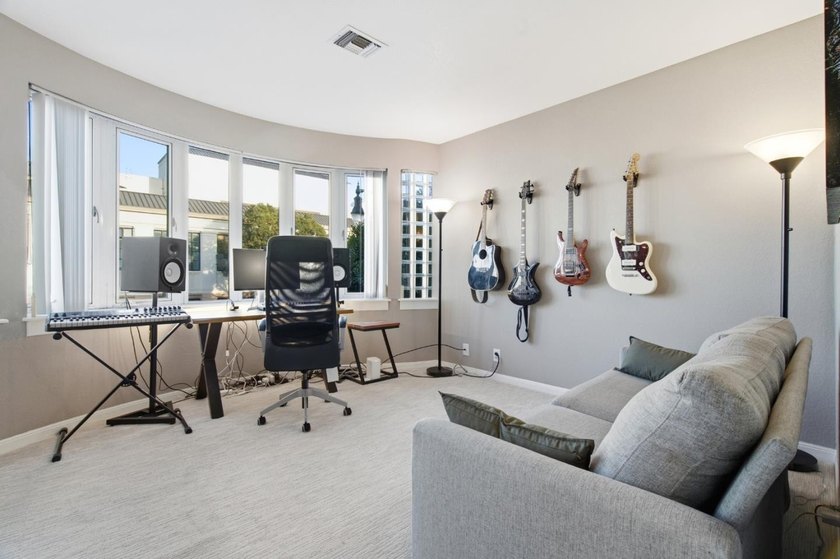 Welcome to this stunning 2-bedroom, 2-bath corner residence in a - photo 36