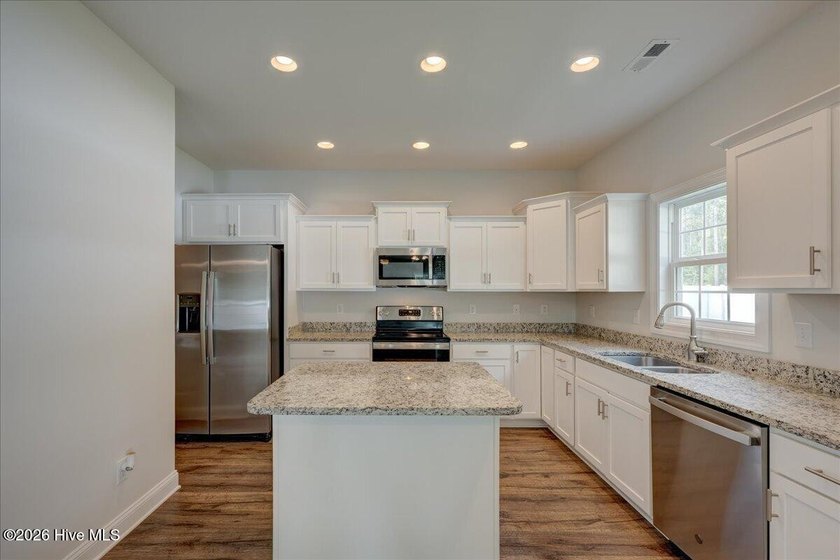 Move-in-ready 4 bedroom, 2.5 bath home perfectly tucked in the - photo 15