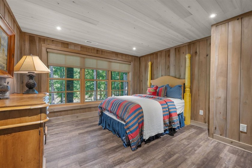 Experience lake living at its finest in this custom-built - photo 18