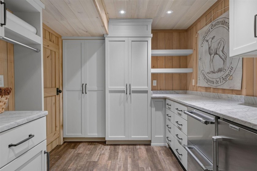 Experience lake living at its finest in this custom-built - photo 21