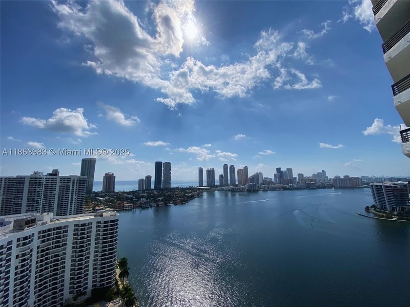 High above the marina, where the breeze carries the hush of the - photo 11