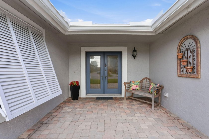 Welcome to this beautifully updated one-story pool home in - photo 2