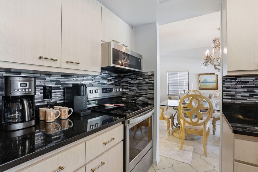 Welcome to this beautifully updated one-story pool home in - photo 9