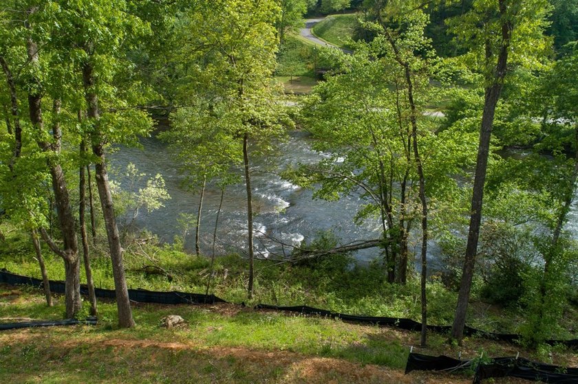 Come see this great River Front homesite in one of the new and - photo 3