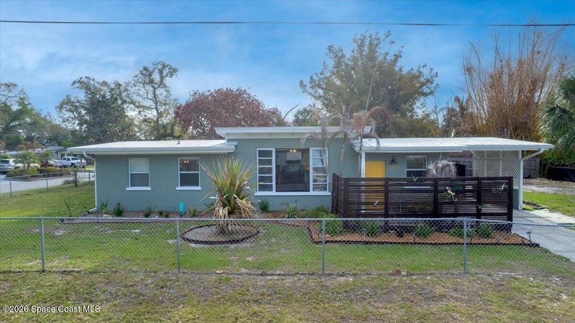 This charming mid-century, 3-bedroom home sits proudly on a - photo 34