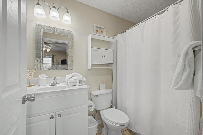 Fully furnished and turnkey, this beautifully maintained coastal - photo 29
