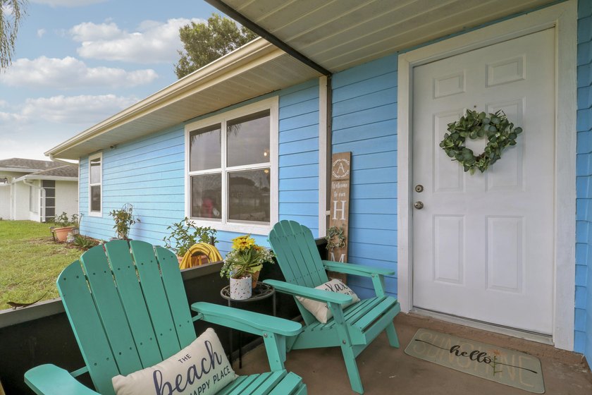 Move-in ready and packed with valuable upgrades, this 3-bedroom - photo 2