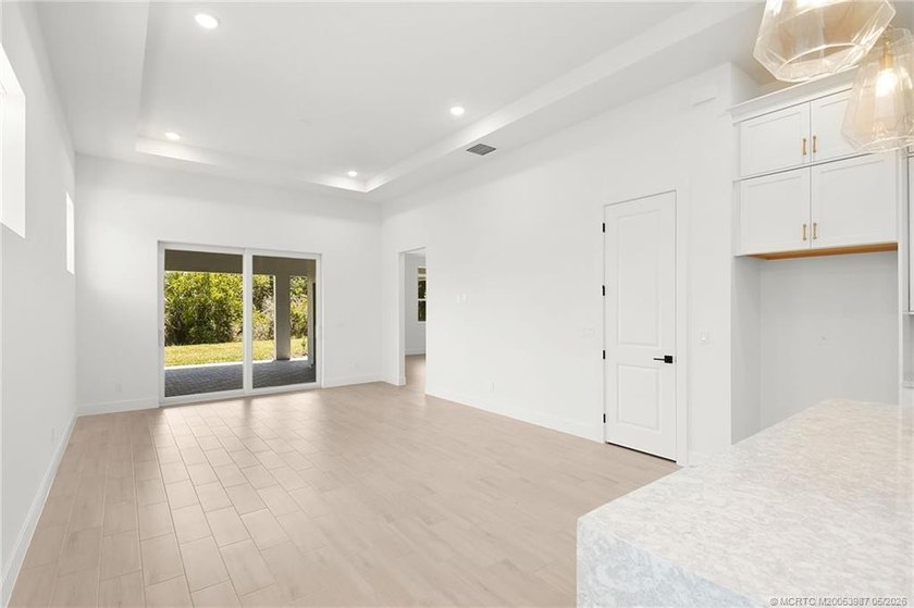 Move-in ready, NEW construction by TRUST HOMES. This 3/2/2/ lake - photo 11