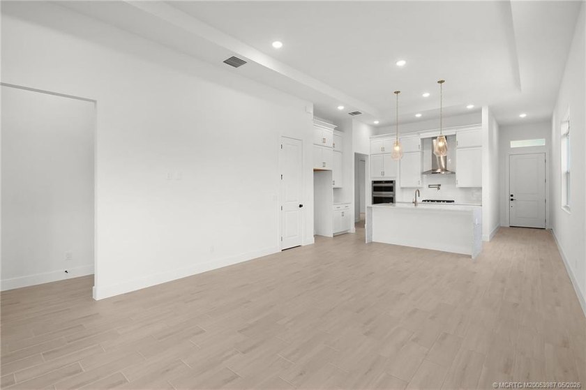 Move-in ready, NEW construction by TRUST HOMES. This 3/2/2/ lake - photo 13