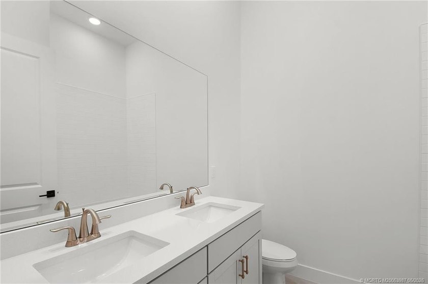 Move-in ready, NEW construction by TRUST HOMES. This 3/2/2/ lake - photo 30