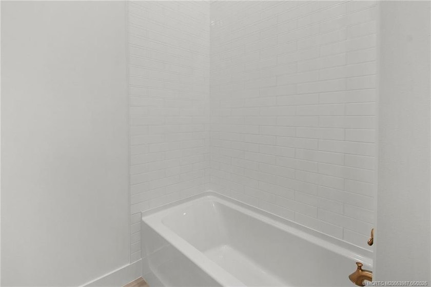 Move-in ready, NEW construction by TRUST HOMES. This 3/2/2/ lake - photo 31