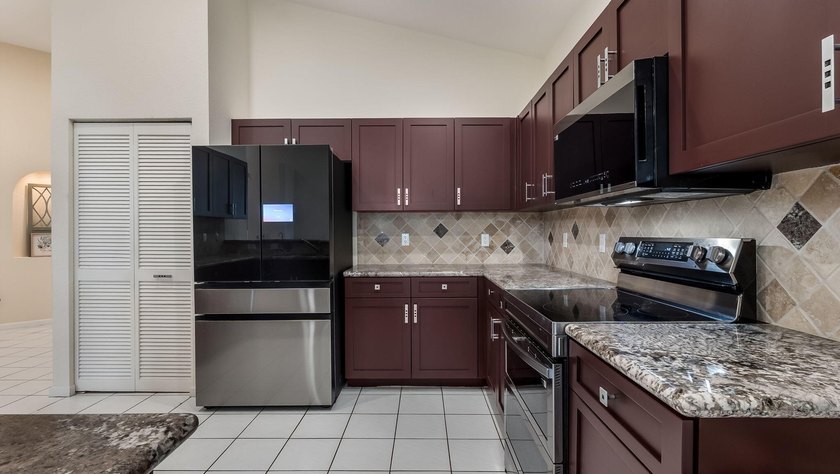 Welcome to your private retreat in the highly sought-after gated - photo 23