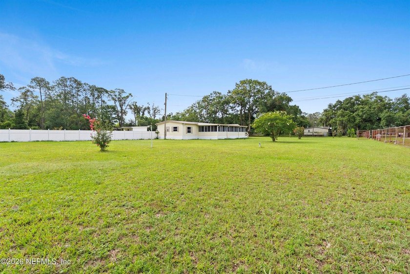 Rare opportunity to own 1.86 fully fenced acres in Jacksonville! - photo 13