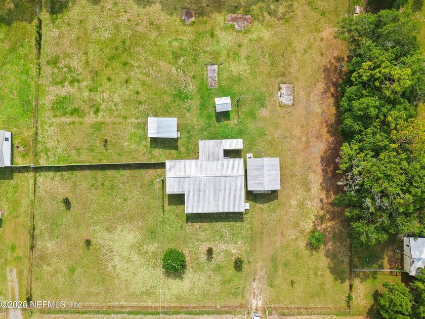 Rare opportunity to own 1.86 fully fenced acres in Jacksonville! - photo 17