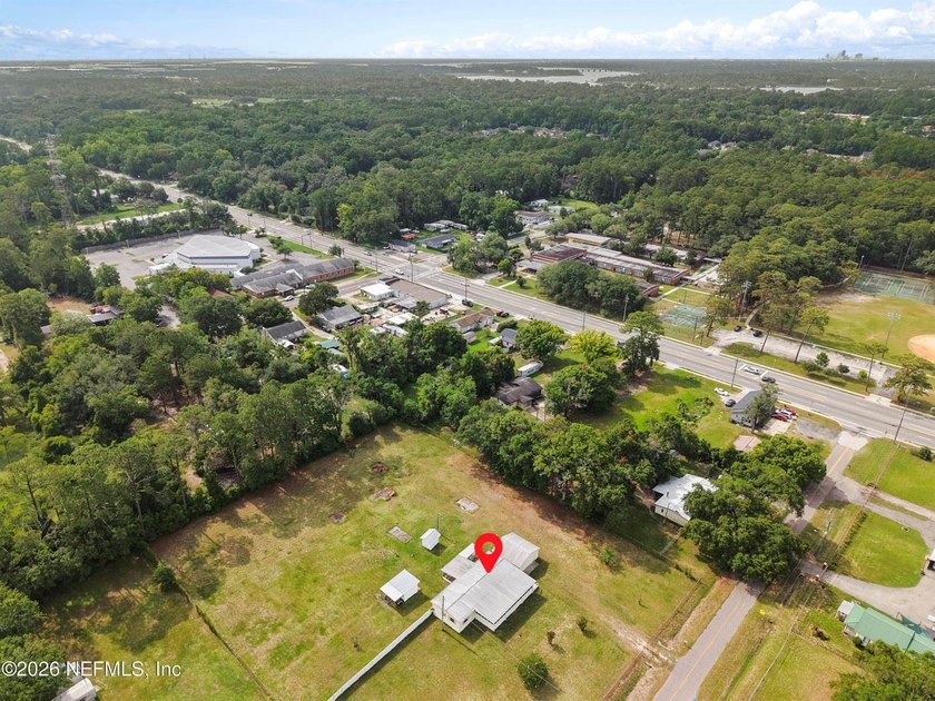 Rare opportunity to own 1.86 fully fenced acres in Jacksonville! - photo 18