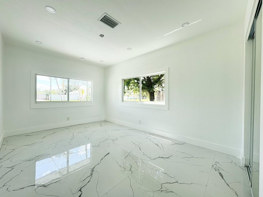 Charming 4-bedroom, 2-bath home on septic in desirable Palm - photo 17