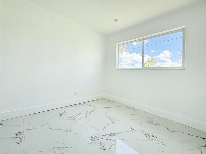 Charming 4-bedroom, 2-bath home on septic in desirable Palm - photo 22